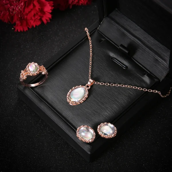 Kiss Jewelry Pink Rhinestone Cross Necklace & Earrings - Image 8